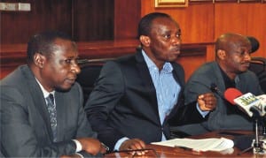 L-R: General Manager, Finance and Management Services, Nigerian Electricity Regulatory Commission (NERC), Mr Mustapha Bukar, Chairman, Dr Sam Amadi and Deputy General Manager, Engineering Standard and Safety,  Mr Abdu Bello, at a news conference in Abuja, recently.