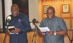 Hon Isobo Jack (left) and Engr Ode ThankGod, during their swearing-in as commissioners by Rivers State Governor, Rt Hon Chibuike Amaechi at Government House, Port Harcourt, last Monday
