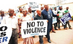 Founder, Igbo Youth Movement (IYM), Comrade Elliot Uko (left), with members of IYM and South-East Self Determination Coalition on a peaceful rally on violence free 2015 elections in Enugu recently. Photo: NAN