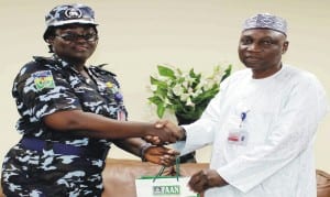 The New Commissioner of Police, Murtala Muhammed Airport, Dorothy Gimba (left), with the Managing Director, Federal Airports Authority of Nigeria (faan), Mr Saleh Dunoma, during her courtesy visit to faan's Managing Director in Lagos.                   Photo: NAN