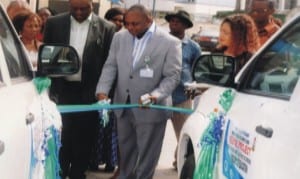 Permanent Secretary, Ministry of Budget and Economic Planning, Rivers State, Mr Austine Orlu-Orlu (middle), commissioning SEEFOR project buses in Port Harcourt last Monday. With him are SEEFOR officials Photo: Obina Prince Dele