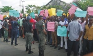 APC youths demanding for fair policing in Port Harcourt, Rivers, yesterday 