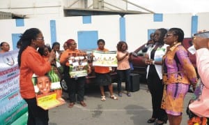 Rivers State chairman, National Association of Women Journalists (NAWOJ), Mrs Lilian Okonkwo (left), addressing newsmen during a road walk to commemorate International Women’s Day, in Port Harcourt, yesterday.