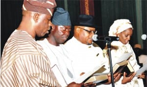 L-R: Minister of State for Foreign Affairs 2, Sen. Musliu Obanikoro, Minister of Labour, Joel Ikenya; Minister of State for Trade and Investment, Kenneth Kobani and Minister of State for Niger Delta, Mrs Hauwa Lawan, taking oath of office as ministers of the Federal Republic before President Goodluck Jonathan, during the Federal Executive Council meeting in Abuja last Wednesday.