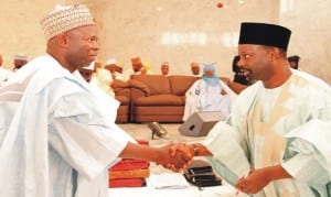 Governor Ibrahim Dankwambo of Gombe State (right), congratulating a newly appointed Permanent Secretary, Mr Renos Kabiny, during the swearing-in of six permanent secretaries and Six Special Advisers in Gombe State, recently. Photo: NAN