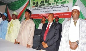 L-R: Majority Leader, Kaduna State House of Assembly, Alhaji Muhammed Yunusa; Sen. Ahmed Makarfi; Gov. Mukhtar Yero; Branch Controller,  CBN Kaduna Branch, Alhaji Ibrahim Gusau and Kpop Gong, Retired Col. Paul Zakka Wyom, at the inauguration and presentation of cheques to beneficiaries of Micro, Small and Medium Enterprises Devolopment Fund in Kaduna, yesterday.     Photo: NAN