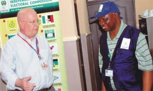 American Ambassador to Nigeria, Mr James Entwistle (left), with INEC Resident Electoral Commissioner for FCT, Prof. Jacob Jatau (right),  during the Ambassador's visit to the commissioner during the presidential election in Abuja, Saturday