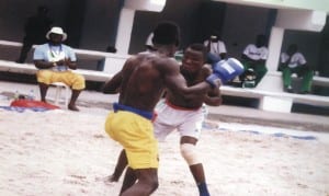 Athletes showing off skills in one of the national traditional sports at a recent tournament