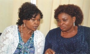 Permanent Secretary, Ministry of Social Welfare and Rehabilitation, Rivers State, Ms Kadilo Brown (right) conferring with  former Permanent Secretary of the Ministry, Dr Mrs Stella Toby during the send-forth of  retirees of the ministry in Port Harcourt recently.     Photo: Chris Monyanaga