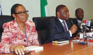 L-R: Head, Legal and Regulatory Department, Nigerian Communications commission, Mrs Yetunde Akinloye, Director, Public Affairs, Mr Tony Ojobo and Director, Spectrum Administration, Rev. Nwaulune Augustine, at the ncc news conference on the 2.6ghz frequency spectrums inAbuja, recently. Photo: NAN