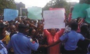 Members of sixteen political parties demanding the removal of the Resident Electoral Commissioner for Rivers State, Gesila Khan in Abuja, yesterday