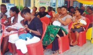 Mothers breast-feeding their babies in Port Harcourt.