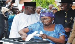 Mother of the President, Mrs Eunice Jonathan casting  her vote for the House of Assembly election  at  the INEC Ward 13, Unit 39 Otuabla Otuoke in Ogbia Local Government Area of Bayelsa State last Saturday.    Photo: NAN