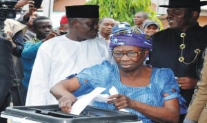 Mother of the President, Mrs Eunice Jonathan casting  her vote for the House of Assembly election  at  the INEC Ward 13, Unit 39 Otuabla Otuoke in Ogbia Local Government Area of Bayelsa State last Saturday.    Photo: NAN