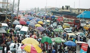 Traders taking over a yet to be commissioned road at Ikorudu Round About in Lagos last Thursday.     Photo: NAN