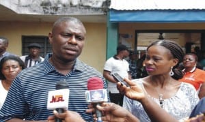 Dr. Dakuku Peterside, APC governorship candidate in Rivers State with his wife, Elima, speaking to news men after accreditation at his hometown in Opobo-Nkoro