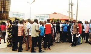 Former PHCN workers protesting  non-payment of their entitlements  at the National Industrial Court in Ibadan, Wednesday