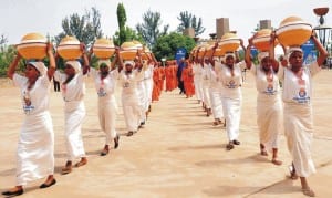 The 'Milk Maids', symbols of Kaduna International Trade Fair, on pararade at the opening ceremony of the 36th Kaduna International Trade Fair in Kaduna last Saturday.