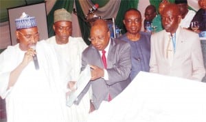 L-R: Accountant-General of the Federation, Mr Jonah Otunla; Representative of the Vice President, Amb. Bashir Yuguda; Head of the Civil Service of the Federation, Mr Danladi Kifasi; Permanent Secretary, Ministry of Land and Urban Development, Mr George Ossi and Auditor-General of the Federation,  Mr Samuel Ukura,  during  the Launch of Accrual Accounting Manual,  International Public Sector Accounting Standards  Compliant In Nigeria (IPSAS)  in Abuja on Monday.