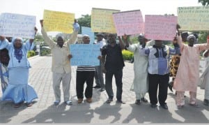 The  Nigeria Social Insurance Trust Fund's Pensioners protesting in Abuja, Monday 