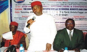 President of Oniccima, Dr Tim Anosike (middle) addressing  members, during the Oniccima AGM in Awka, yesterday. With him are the Deputy President, Mr Uche Apakama (right) and the Traditional Ruler of Awka, Igwe Gibson Nwosu.