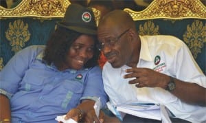 Rivers State Head of Service, Samuel LongJohn (right) discussing with the state NLC Chairperson, Mrs Beatrice Itubo, during the 2015 Workers’ Day celebration in Port Harcourt, last Friday.