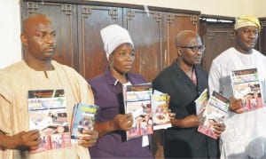 L-R: Executive Director, Refocusing Nigerians Talents Organisation, Mr Abanka Musa, Mrs Olowu Esther, members, Refocusing Nigerians Talents Organisation, Dr Ayotunde Kehnde and Retired Col. Henry Ikoghode, presenting  books and magazine  on Strategic Advocacy and Promotions of Indigenous Inventors/Innovations for Wealth/Job Creation in Nigeria” in Abuja, recently.