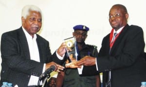 Former Vice President, Dr Alex Ekwueme (left), receiving a plaque from the President, Nigeria Institute of Architects (nia), Mr Niyi Brimmo, at the first annual lecture series of the nia delivered in honour of Dr Ekwueme in collaboration with Lafarge Africa Plc in Abuja, recently. Photo: NAN
