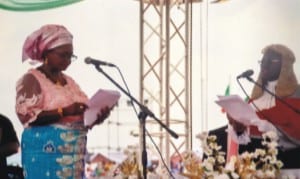 Deputy Governor of Rivers State, Dr (Mrs) Ipalibo Harry-Banigo (left) before Chief Judge of Bayelsa State, Justice Kate Abiri during her swearing-in ceremony at Liberation Stadium, Port Harcourt last Friday. Photo: Chris Monyanaga