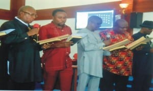 Hon Isreal Mgbuelo (2nd right) and Hon Dinedoeni Loolo (2nd left) with other lawmakers during inauguration of the 8th Assembly in Port Harcourt, last Monday.                                                                   Photo: Chirs Monyanaga