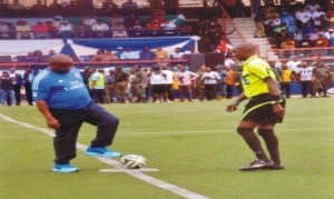 Rivers State Governor, Chief  Barr Nyesom Wike (Left), taking a kick off during a novelty  football match at the Shark  Stadium, to mark his inauguration,  recently.      Photo: Chris Monyanaga