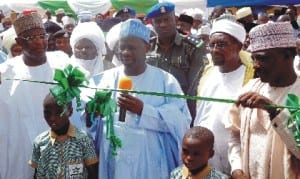 Governor Ibrahim Dank Wambo of Gombe State (middle), Inaugurating the Inuwa orphanage Foundation in Gombe last Wednesday. With him are the Acting Secretary to the State government, Mr James Pisaghi (left)and the immediate past Speaker, Gombe State House of Assembly and Alhaji Inuwa Garba (right).
