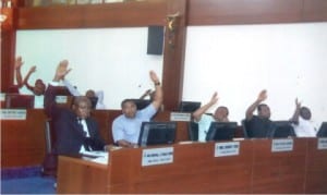 Members of the Rivers State House of Assembly voting yesterday to  approve a N10bn loan from Zenith Bank Plc for the State Governor to undertake developmental projects in the state. 
