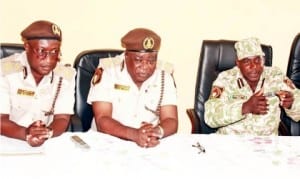 L-R: Comptroller of Immigration, Bayelsa Command, Mr Wunti Sule; Assistant Comptroller-General, Zone G, Mr Emmanuel Guuga and Zonal Comptroller, Benin-city, Mr Nbesis Jacob, at an interactive session by Nigeria Immigration Service, Bayelsa Command, in Yenagoa, last  Monday