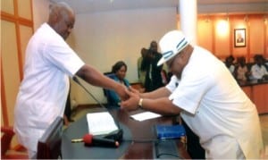 Governor Nyesom Wike of Rivers State (left), congratulating the new Secretary to the State Government, Chief Kenneth Kobani, after his swearing-in at Government House, Port Harcourt, last Friday.    Photo: Chris Monyanaga