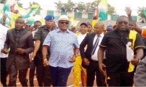 Governor Willie Obiano of Anambra State (middle), Rommy Ezeonuwuka (left) and other officials, at the inauguration of 8-Lane Olympic Standard Tartan Tracks at Rojenny Stadium in Oba, last Thursdays