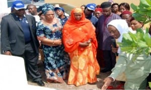 A Corps Member, Miss Jalila Ahmad (right), showing the Head of Community Development Service, Fct Nysc, Hajia Hajara Hussein (middle), the bore hole she rehabilitated at Jikwoyi Primary Health Care Centre in Abuja on Monday. With them are from left: Director, Human Resources Department, Nigeria Deposit Insurance Corporation, Mr Mohammed Ahmed, Supervisory Councillor for Health, Abuja Municipal Area Council, Mrs Josephine Nnodim and Incident Manager, Nigeria Centre for Disease Control, Dr Kenneth Madiebo.