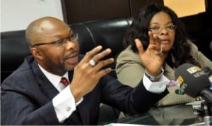 Permanent Secretary, Federal Ministry of Health, Mr Linus Awute (left), speaking during the opening ceremony to mark the World Sickle Cell Day in Abuja on Friday. With him is the Head/Director, Department of Public Health,Federal Ministry of Health, Dr Bridget Okoeguale