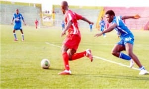 Action between Dolphins and Sharks  FCs in a Globacom Premier League game at the Liberation Stadium, Port Harcourt