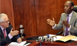 Leader of delegation, European Union Consultants on Energy, Peter Cameron (left), and the NERC Chairman, Dr Sam Amadi, during a meeting with the delegation in Abuja, yesterday