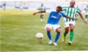 Sharks player (left) being shadowed by an apponent in a Glo Premier League game