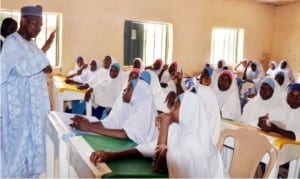 Governor Atiku Bagudu of Kebbi State (left) interacting with students of the Government Girls Secondary School Bunza, during his visit to the school, last Friday.