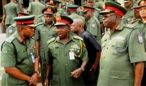 L-R: Commandant, 42 Div., Nigerian Army Engineering Corps, Brig.-Gen. Henry Ayamasaowei, GOC. 2 Div.,  Brig.-Gen. Sanusi Muazu and Corps Commander, Education Corps, Maj.-Gen. Sunday Adebayo, at the 2015 second quarter conference of the Nigeria Army Education Corps in Ibadan, yesterday.