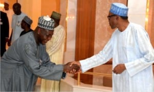 President Muhammadu Buhari ( right) in a handshake with the Clerk of the National Assembly, Salisu Maikasuwa after breaking of Ramadan Fast at the Presidential Villa Abuja, last Monday