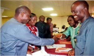 Representative of NUJ National Secretariat, Jame Uwem (2nd right) and Vice President, S’South Zone of NUJ, Seyeifa Uzaka (right), congratulating newly elected officers of Rivers State NUJ, shortly after the elections, last Friday.