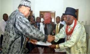 Fromer Chairman, Rivers State Council of Traditional Rulers, King Godwin N.K Giniwa (right), handing over to the new Chairman of the council, King Dandeson Douglas-Jaja, Amanyanabo of Opobo, during the hand over ceremony in Port Harcourt, yesterday