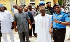 Kogi State Police Commissioner, Mr Adeyemi Ogunjemilusi (right), explaining a point to Governor Idris Wada (2nd-right), during his visit to the Police Headquarters in Lokoja last Monday. With them are the Chief of Staff to the Governor, Alhaji Nasiru Yunusa (left) and the Personal Assistant, Mr Unekwu Sule.