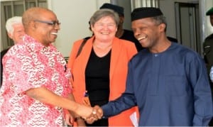 Vice President, Prof. Yemi Osinbajo (right), in a handshake with the Chairman, Nigerian Extractive Industries Transparency International (NEITI) Board, Mr Ledun Mitee, during a courtesy visit to the Vice President  in Abuja .  With him is the Chairman of Etractive Industries Transparency International (EITI) Board, Clare Short