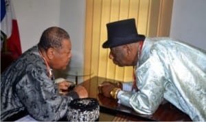 Former Chairman, Rivers State Traditional Rulers Council, King Godwin N.K Giniwa (right), conferring with the new chairman, King Dandeson Douglas Jaja during the handover ceremony, last Thursday.