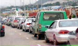 Motorists Queue for petrol at a filling station on Kubwa/Suleja express way in Abuja recently .